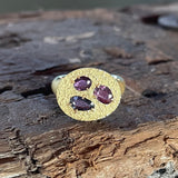 Oval Signet Ring with Purple Sapphires in Sand-Textured 18k Yellow Gold