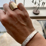 Hammered Oval Bangle in Silver with 10 Grey Sapphires