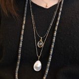 Enhydro Quartz Pendant in 22k and 18k Gold