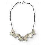 A Roost of Butterflies Necklace in Silver