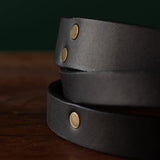 Tapered Black Leather Belt with Antique Brass Rivet Accents