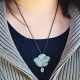 Rain Cloud Brooch/Pendant with with Pale Blue Sapphire in Oxidized Silver & 22k gold