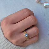 Scooped Prong Round Light Blue Sapphire Ring in 18k Yellow Gold