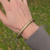 Tapered Oval Bangle in Golden Bronze with Pale Yellow Sapphires