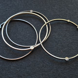 Orbit Bangle in Brushed Silver with Diamonds