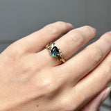 Pear Cut Teal Sapphire and Diamond Sweeping Cluster Ring in 14k Yellow Gold
