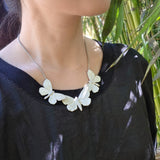 A Roost of Butterflies Necklace in Silver